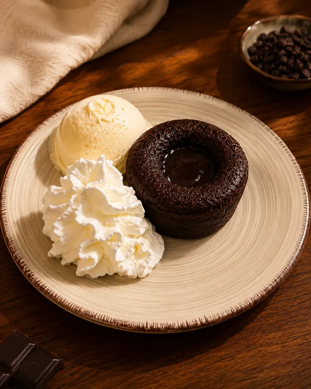 Coulant de chocolate con helado de vainilla - La Parrilla de Champi, Noia